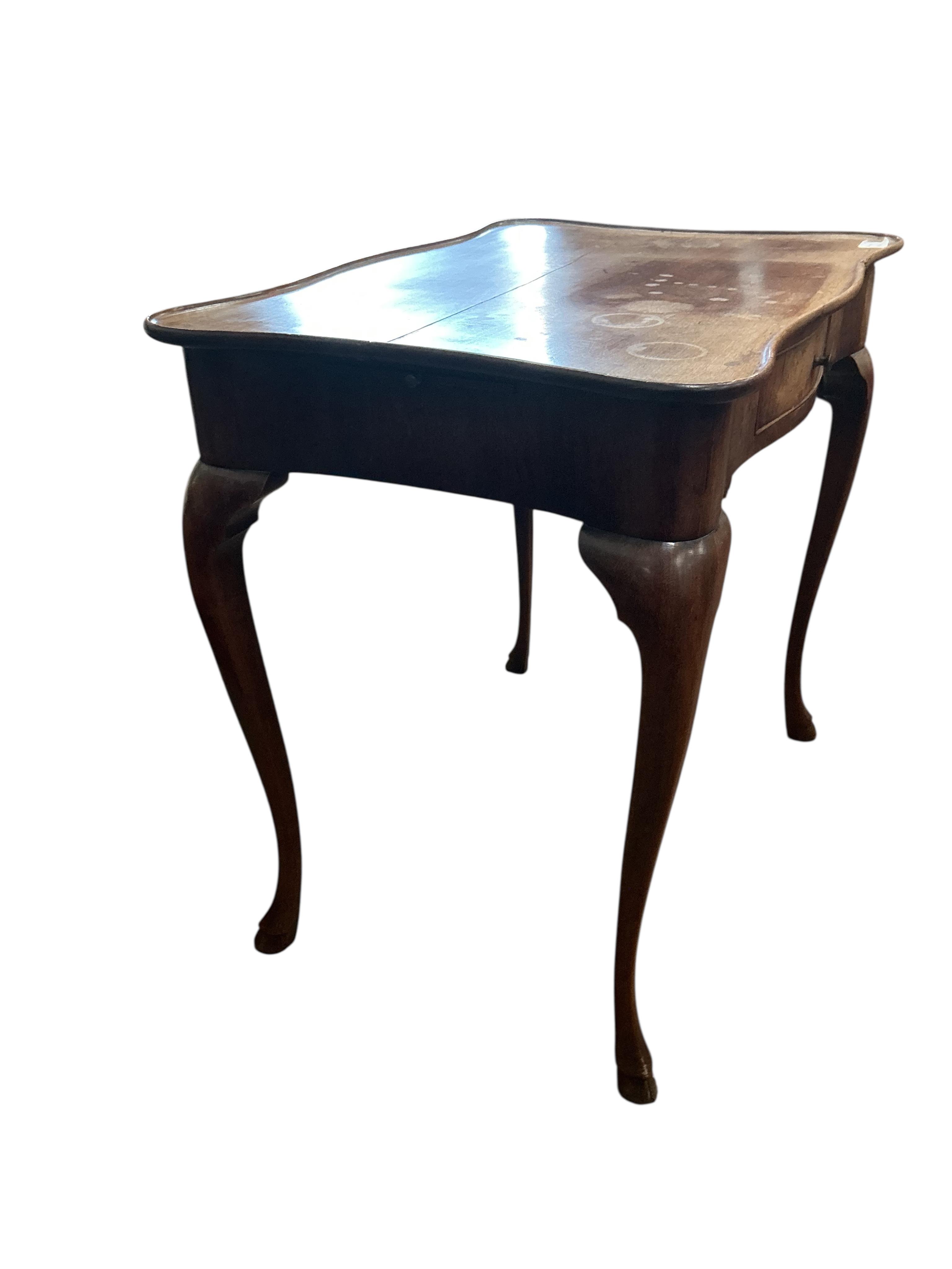 An 18th century rectangular mahogany serpentine side table, fitted with a single drawer, on cabriole legs, width 78cm, depth 53cm, height 72cm